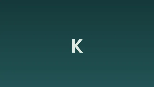 K on dark teal