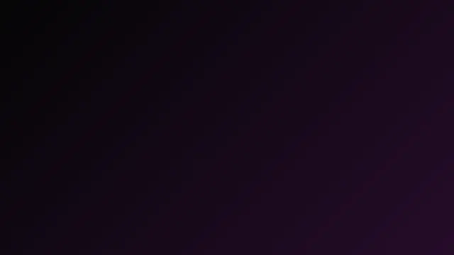 A smooth diagonal gradient from black to deep plum