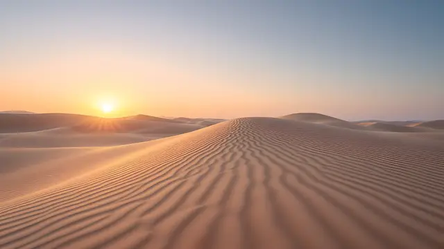 Sand ripples on an empty dune at sunset