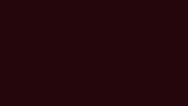 A flat, near-black background with a maroon tint